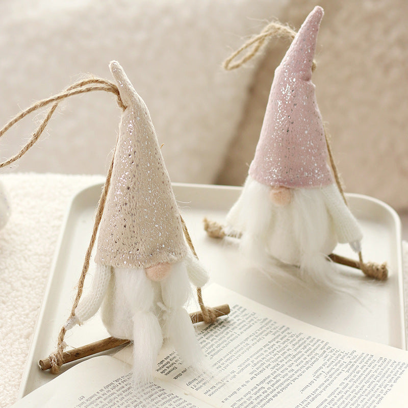 A pair Christmas tree decos gnomes on swings