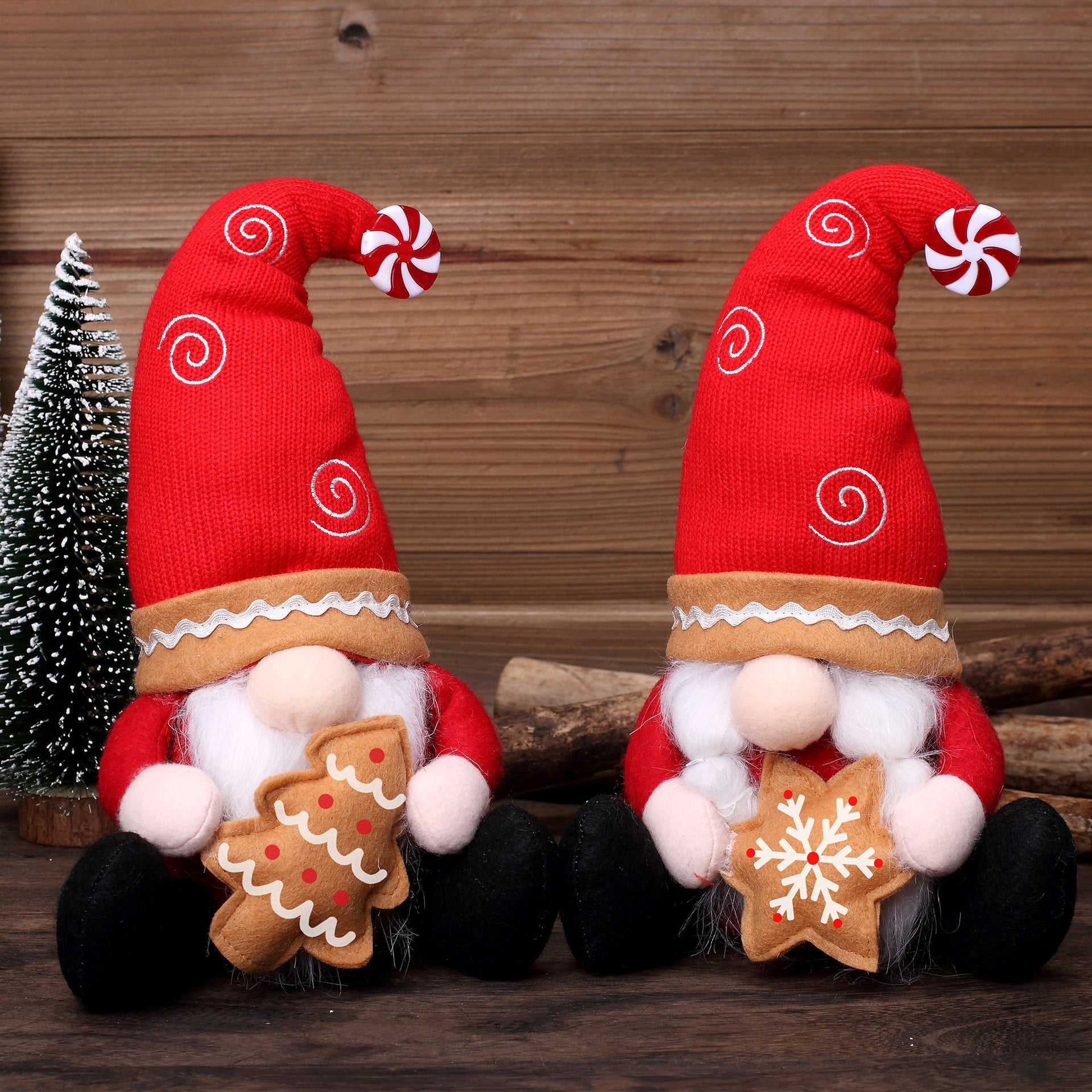 Christmas red gingerbread gnomes holding snowflake and Christmas tree