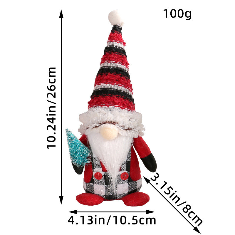 Red Christmas gnomes holding small tree