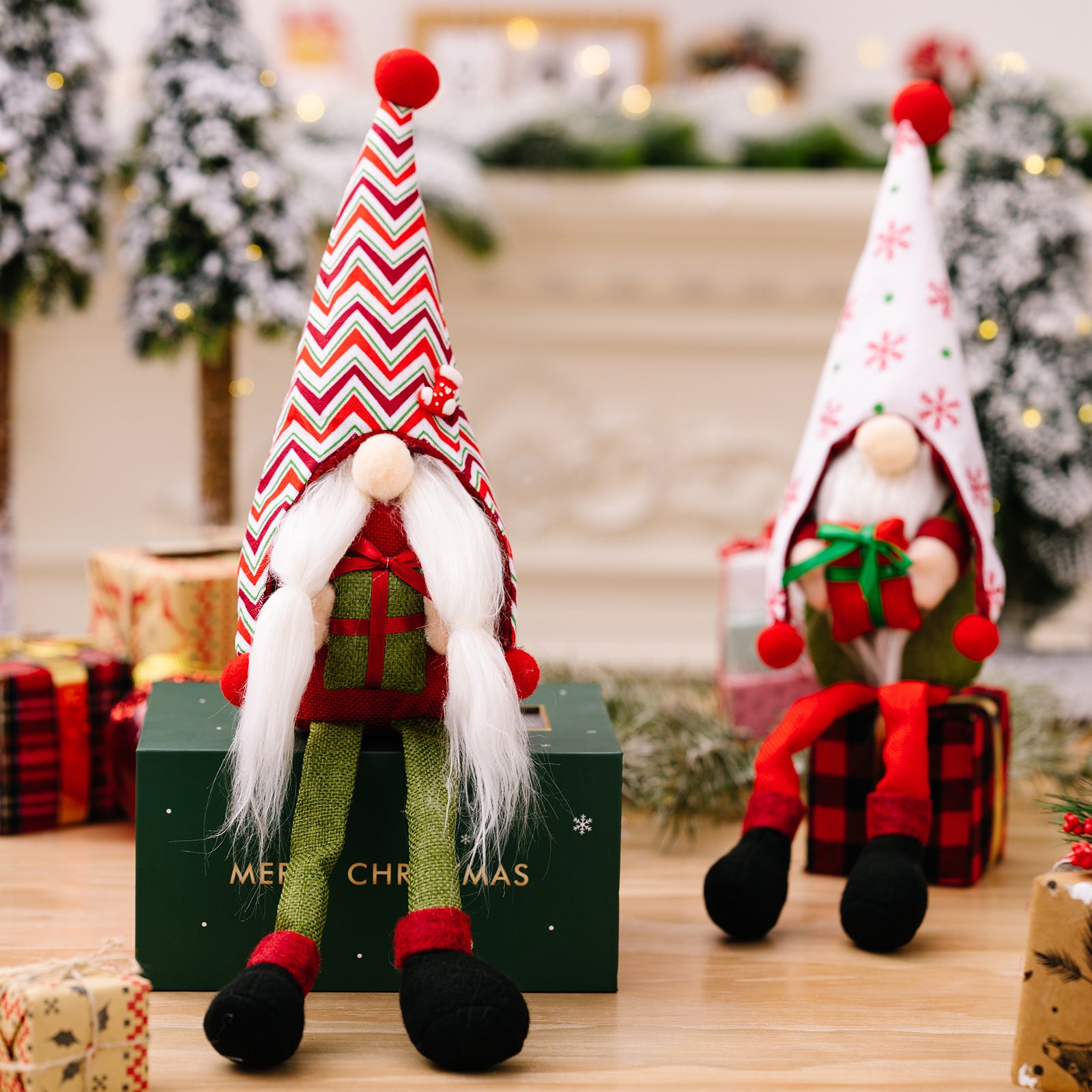 Christmas pointed hat long legg gnomes holding gift box